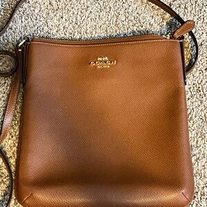 Brown crossbody Coach purse